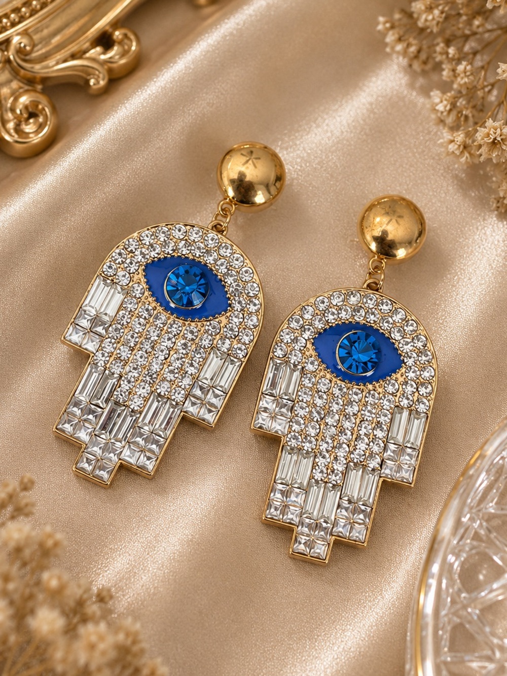 Gold Hamsa Drop Earrings with Blue Crystal Eye
